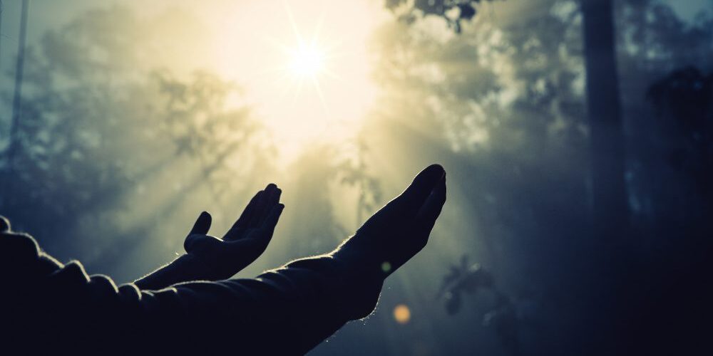 teenage-girl-with-praying-sunny-nature